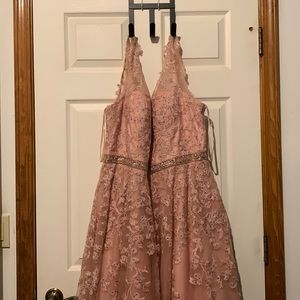 Beautiful prom dress. Worn once. Runs small, fits XL,2X bodies. Well kept.